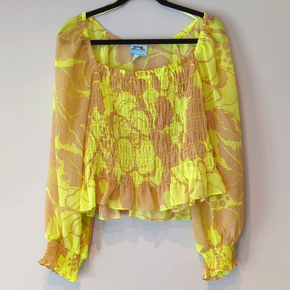 Sheer crop top with ruffled sleeve and waist